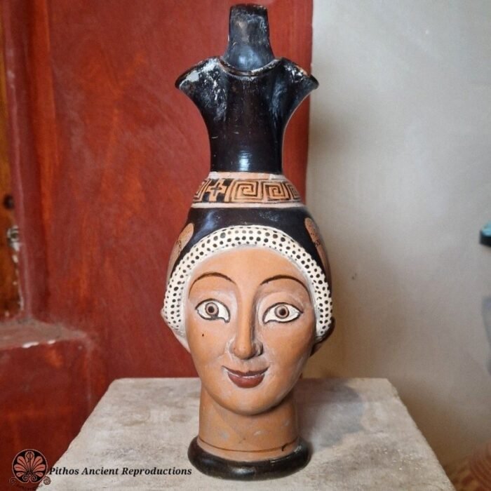 Oinochoe volto donna figure rosse